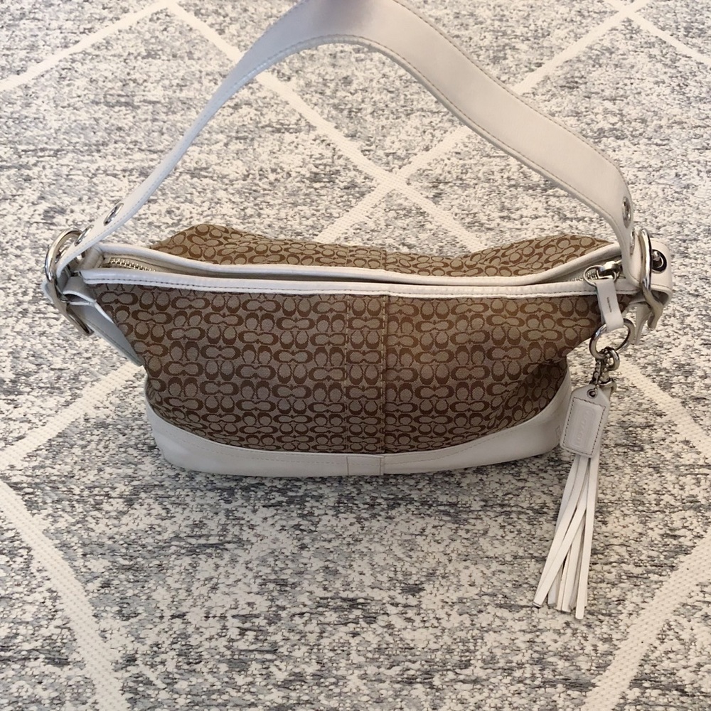 Signature coach bag w/ white leather trim